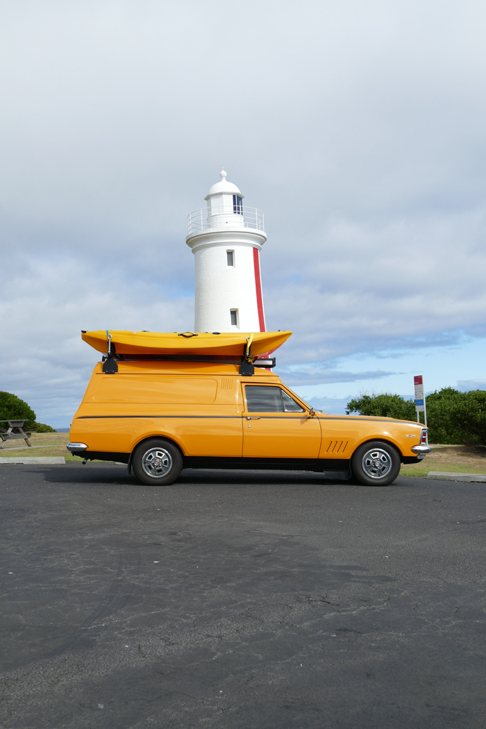 Yellow car at lighthouse